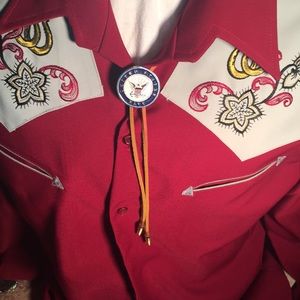 Bolo tie featuring Navy medallion coin